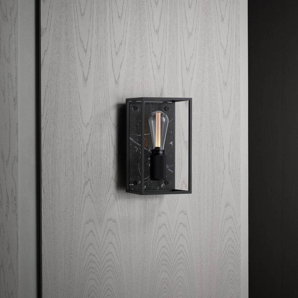 One Light Wall Sconce in Black Marble
