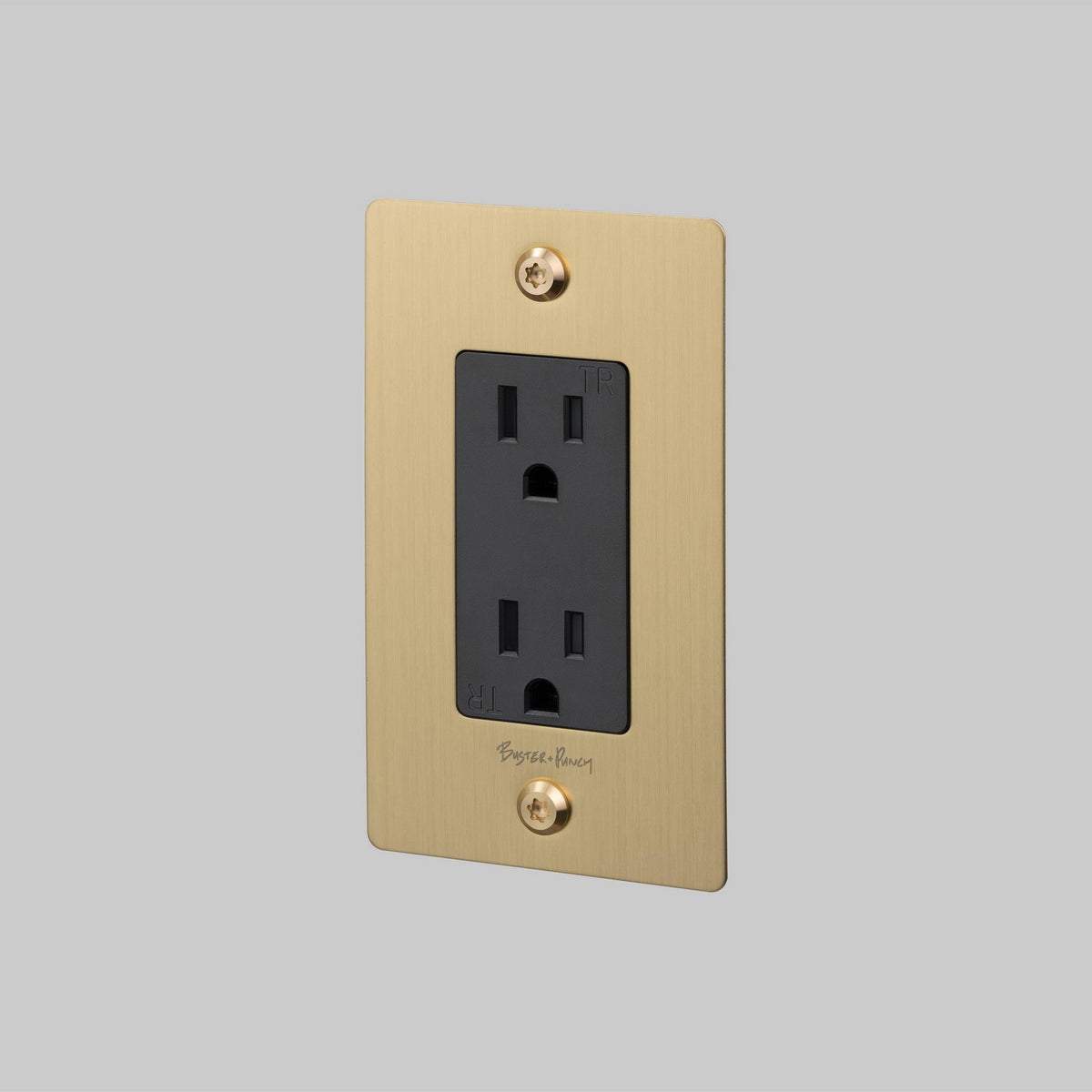 Outlet in Brass