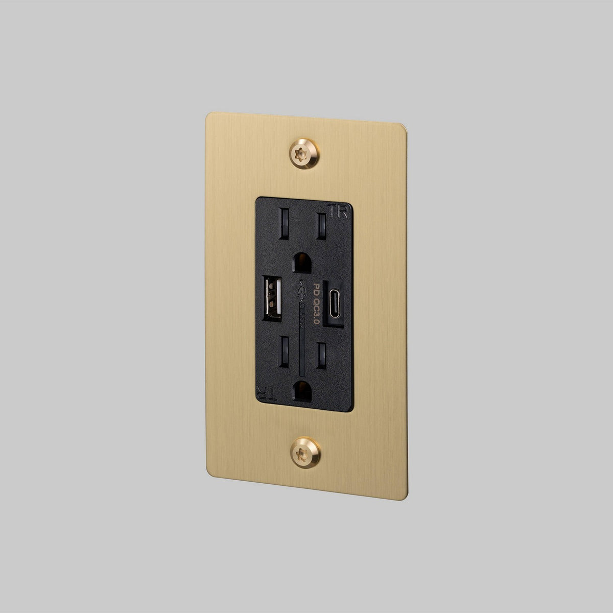 Outlet in Brass