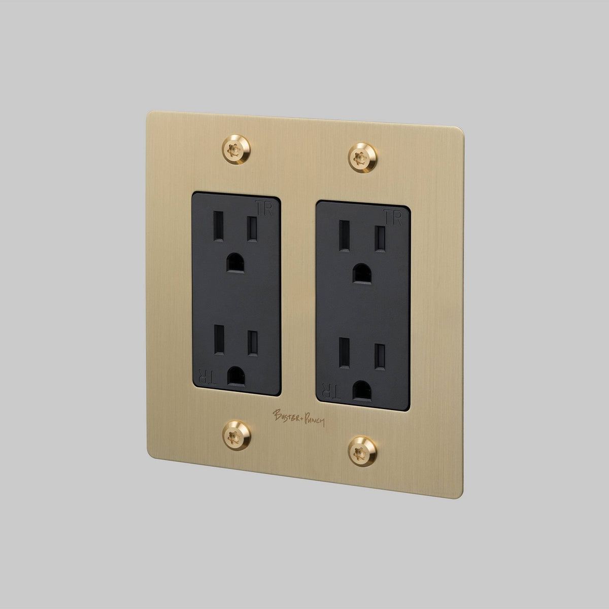 Outlet in Brass