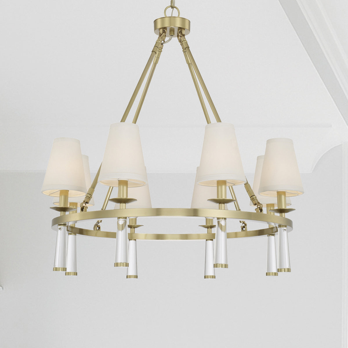 Baxter Eight Light Chandelier in Aged Brass