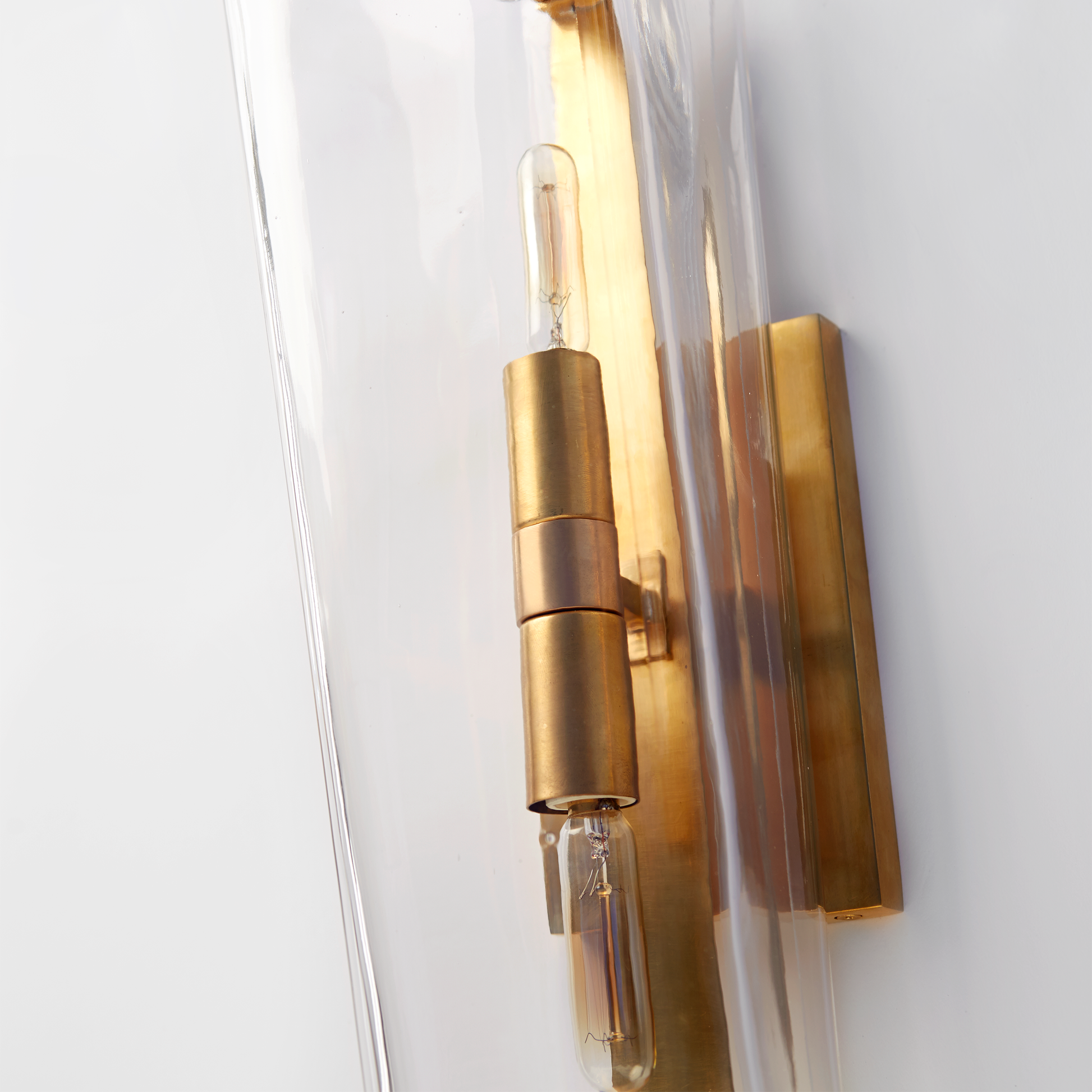 Alpine Single Sconce in Hand-Rubbed Antique Brass with Clear Glass